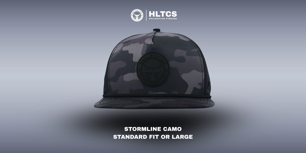 Camouflage cap with 'Halieutics' branding on a gradient background